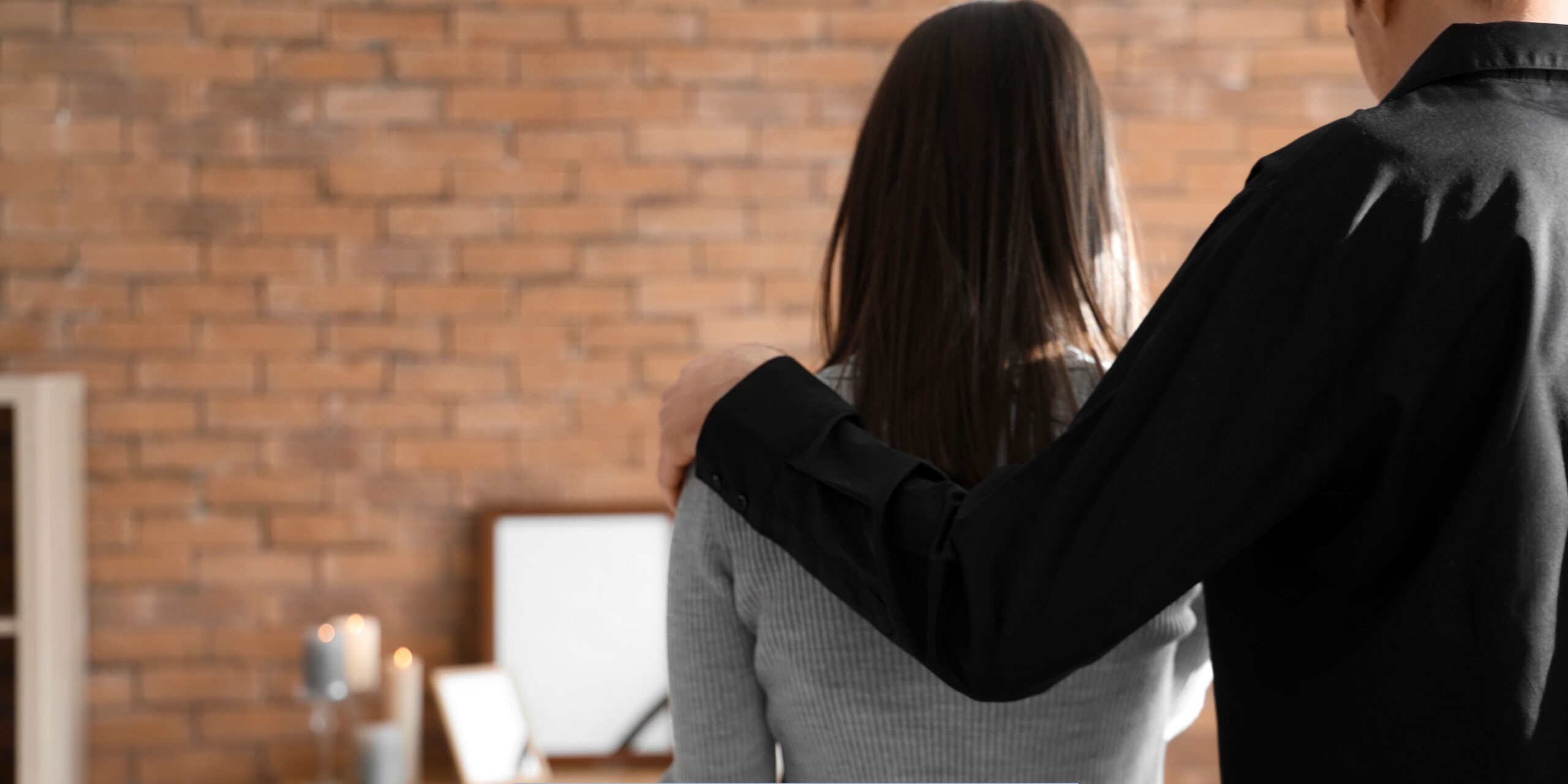 Funeral Home and Cremations in Independence, MO providing compassionate support to a grieving family during a memorial service